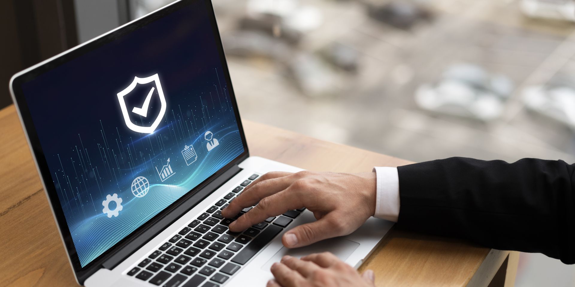 Ecran d'ordinateur portable avec des incones de sécurité informatique